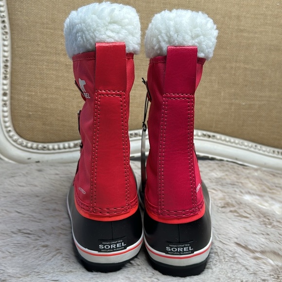 Sorel | Kids' Yoot Pac Waterproof Snow Boot in Bright Rose - Picture 7 of 16